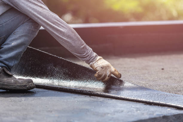 Professional Basement Waterproofing technician working in Jellico, TN